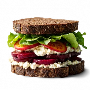 Sandwich Le Nordique: deux tartines de pain nordique avec houmous, tomates, betterave et salade